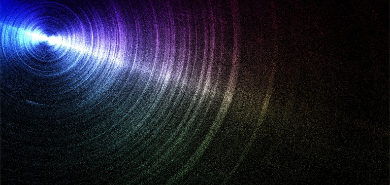 noisey image with many colors in a spiral
